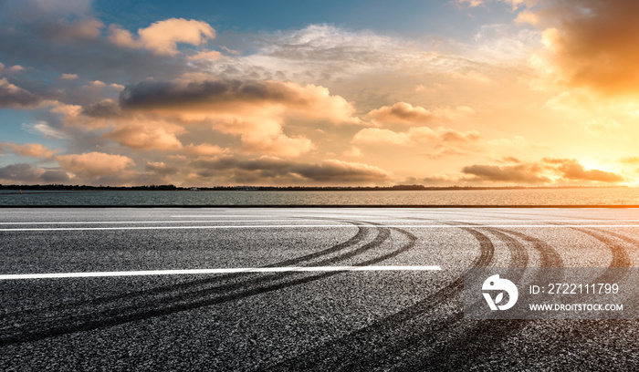 Asphalt road and nature scenery at sunset in spring, Asia