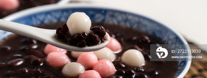 Red and white tangyuan with red bean soup.