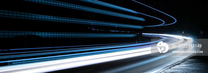 blue car lights at night. long exposure