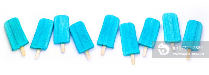 some blue popsicles isolated on a white background for banner, panorama, border