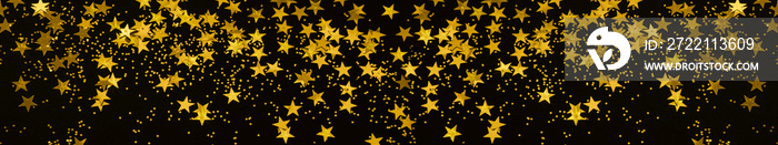 Banner gold star confetti and glitter on a black background - Christmas / New Year party festive backdrop for your projects