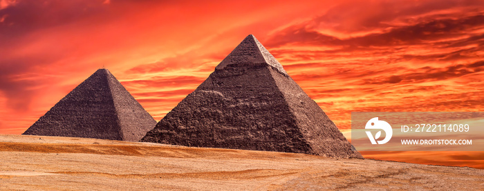 Panorama of the area with the great pyramids of Giza at amazing sunset, Egypt