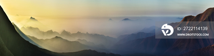 Predawn time in the highlands. mountain silhouettes in the fog