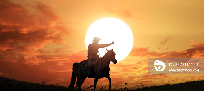 The silhouette of the cowboy sunset landscape.