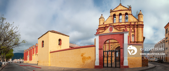 San Cristóbal Cathedral Panorama, Central Park, San Cristobal de las Casas, Mexico. The Cathedral is the symbol of the City’s colonial architecture. It’s facade colorful facade has Baroque influences.