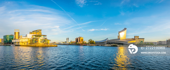 Imperial war museum North and the lowry theater in Manchesterduring sunset, England