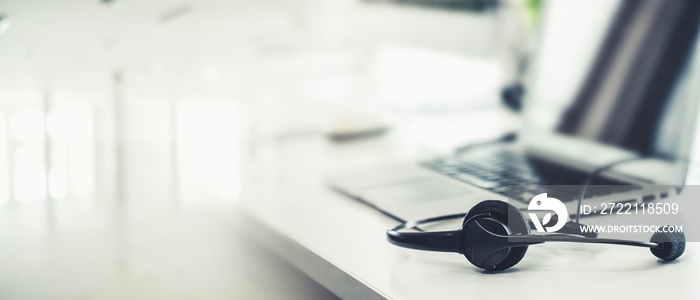 Headset and customer support equipment at call center ready for actively service . Corporate business help desk and telephone assistance concept .