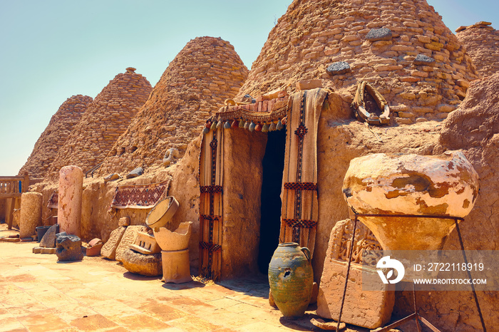 Traditional mud brick made beehive houses. Harran, major ancient city in Upper Mesopotamia, nowadays is a district in Sanliurfa province, Turkiye. Village of beehive houses opposite clear sky