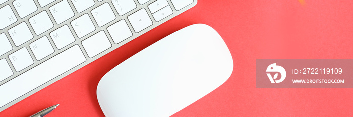 White keyboard with computer mouse and silver