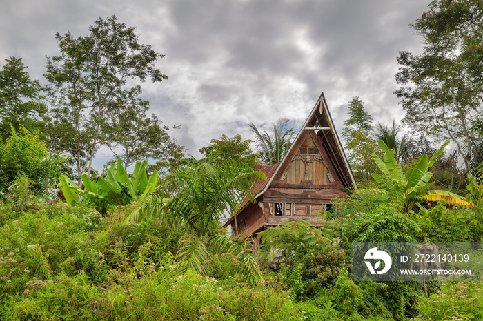 Beautiful view of a traditional Toba Batak house on the island Samosir in Lake Toba, Sumatra, Indonesia