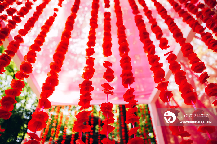 garland of red petals. indian flower garland.