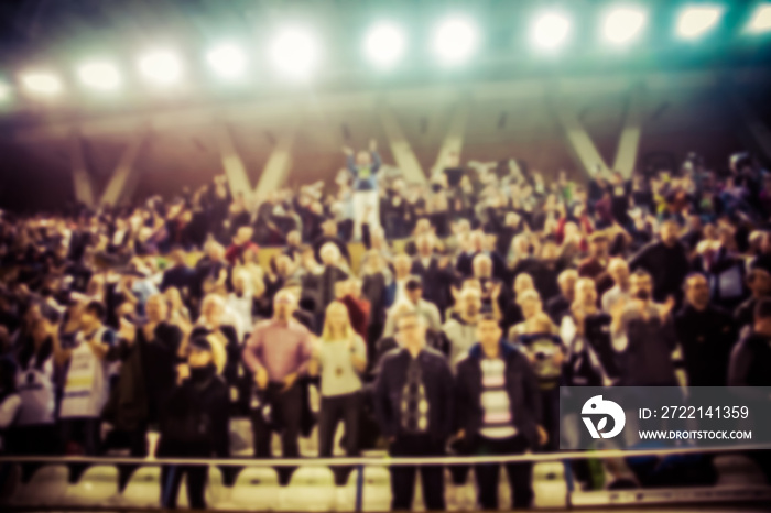 blurred background of crowd of people in a basketball court