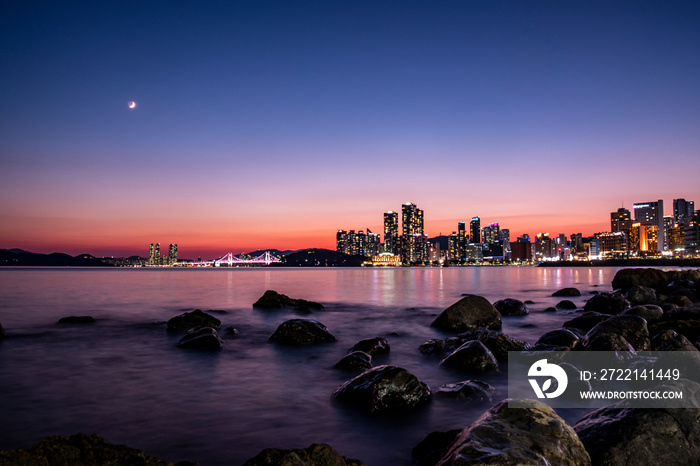 Scenic view of a harbor against sky during sunset