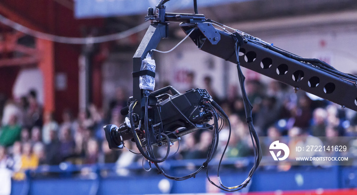 Remote controlled tv camera at indoor event