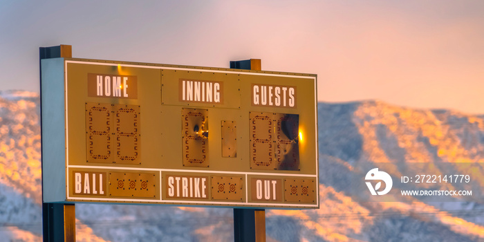 A baseball scoreboard against mountain in Utah