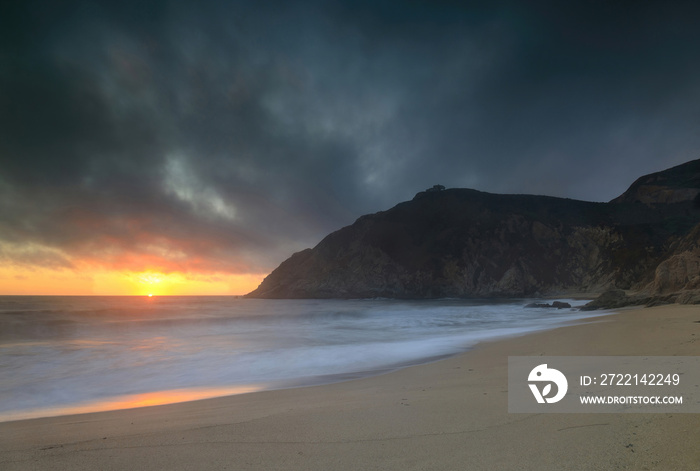 Dramatic Summer Sunset over Montara Mountain via Gray Whale Cove State Beach. Montara and Pacifica. San Mateo County, California, USA.