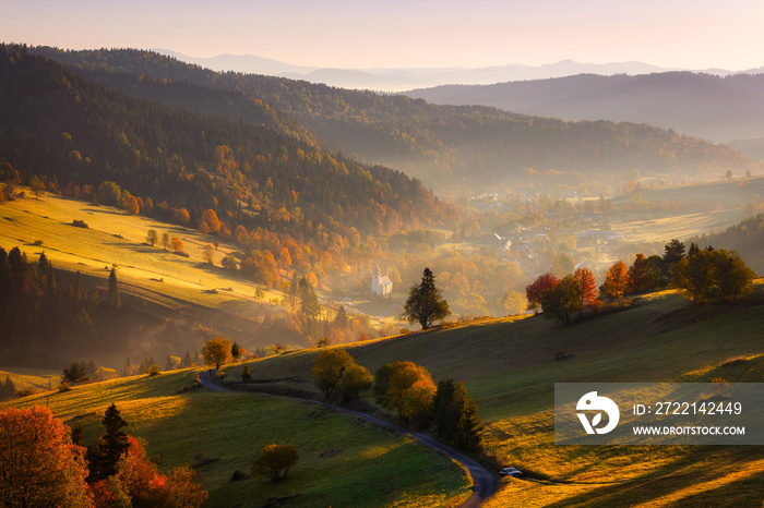 Beautiful autumnal landscape under the Tatra Mountains at sunrise. Slovakia