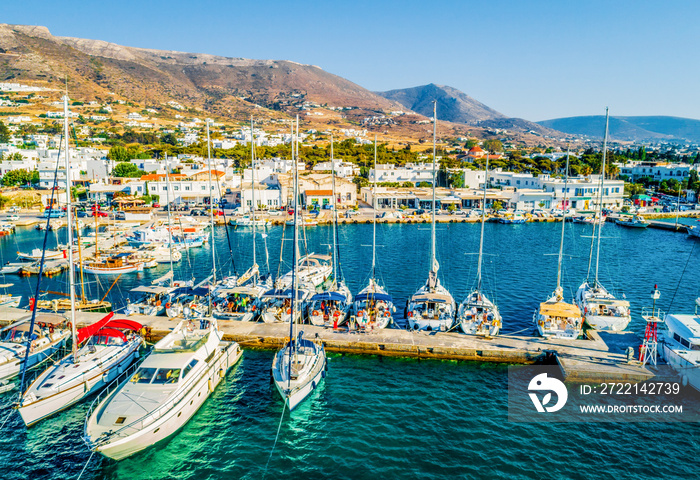 Beautiful view of boats and yachts moored in the marina of Paros Island, Greece