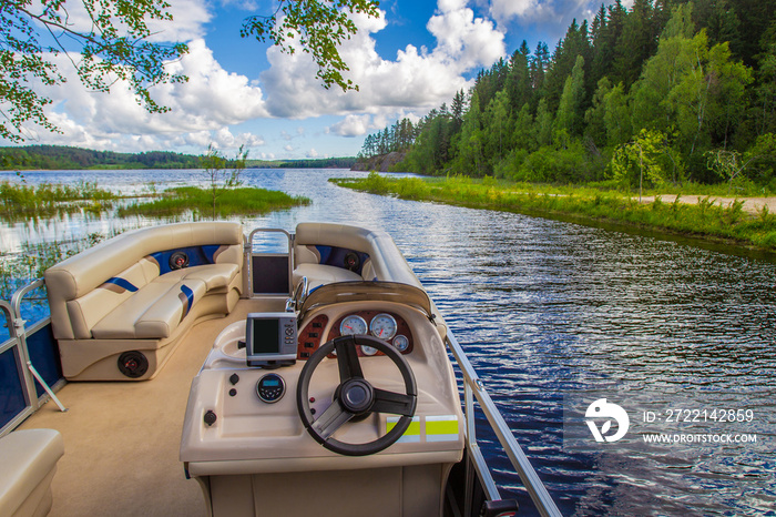 Boat trips. Lake. Powerboat for walking. Boat rental. Rest in the summer. Sunny day.