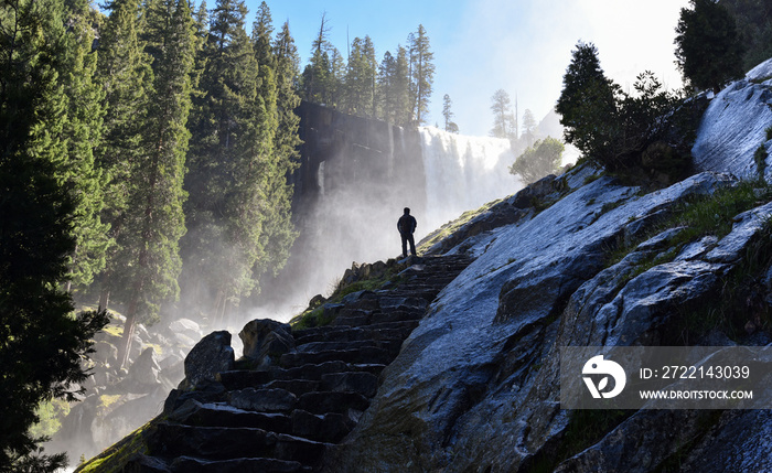 Silhouette of a man watching Vernal Falls in Yosemite National Park, California, USA.