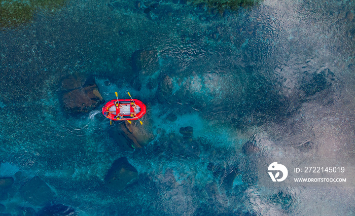 Aerial view rafting on red boat on blue river Turkey. Concept adventure extreme travel