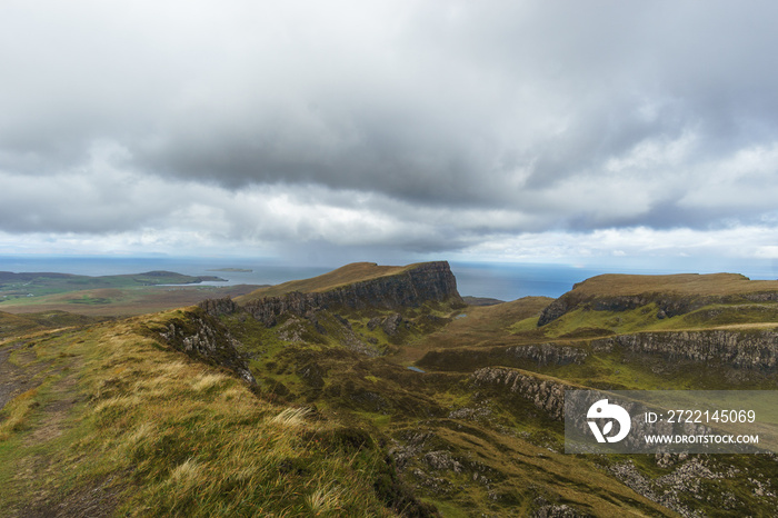 View over rocky landscape of landslide Quiraing on a cloudy autumn day, Isle of Skye, Scotland