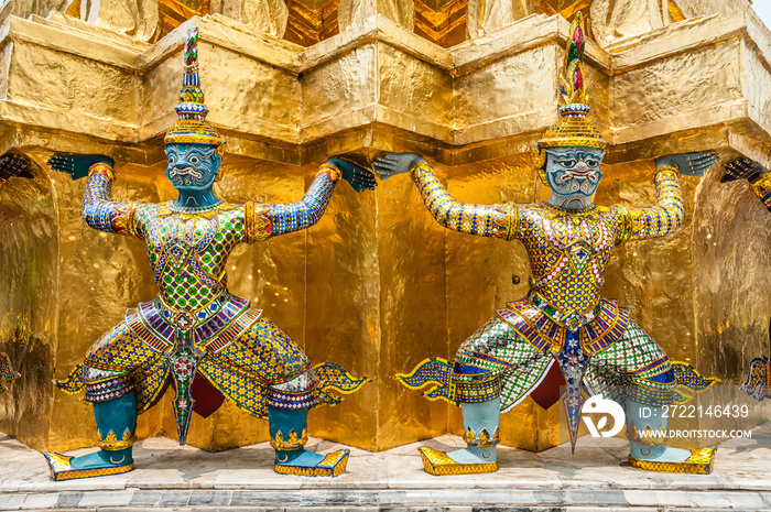 Giants surround the base of Phra Suvarna Chedi Stupa, Wat Phra Kaew, Bangkok, Thailand