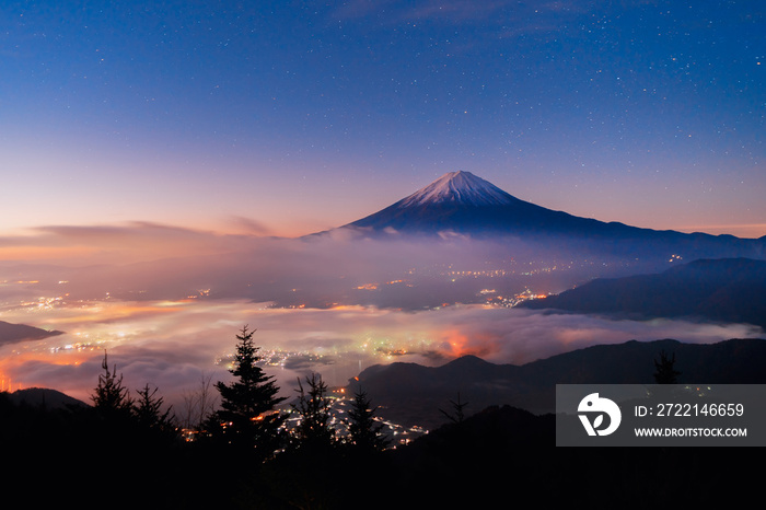 Aerial view of Fuji mountain with mist or fog at sunrise in Fujikawaguchiko, Yamanashi. Fuji five lakes, Japan. Landscape with hills