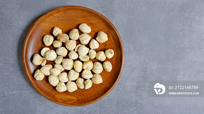 Dried candlenut seeds yellowish white