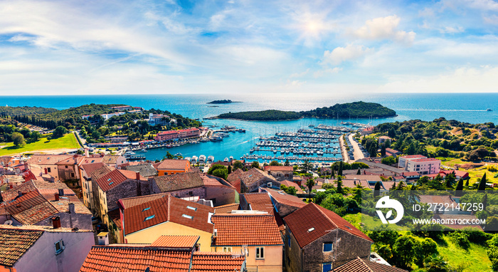 Aerial view of the port of Vrsar (Orsera) town. Colorful spring cityscape of Croatia, Europe. Traveling concept background. Magnificent Mediterranean seascape.