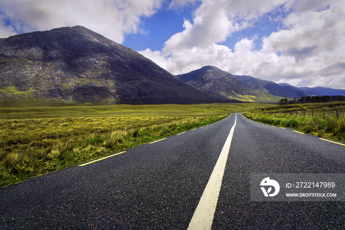 Beautiful landscape scenery of road by the lough inagh with mountains in the background at Connemara National park in county Galway, Ireland