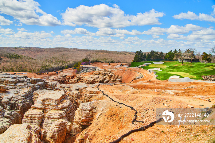 Unusual golf course with collapsed area of rocks and caverns