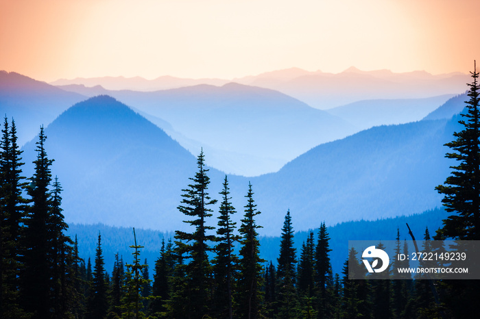 Hazy scenic view of mountain ranges in Mt. Rainier National Park.