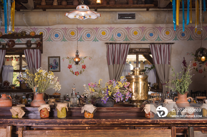 Unique ethnic restaurant interior. Traditional design. Ukrainian rural style and decorations. Europe