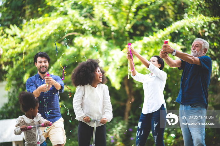 Families of different ages are celebrating at home, happy time outdoor with family