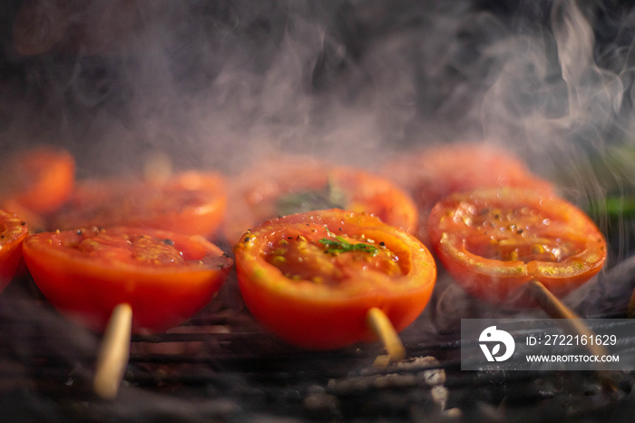 grilling Tomatoes on fire .