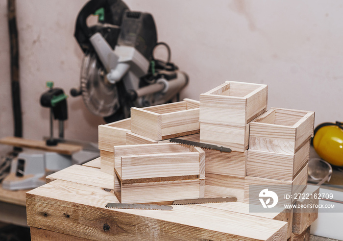 Wooden boxes, blanks in the carpentry workshop. Wood products. Manual production. Natural