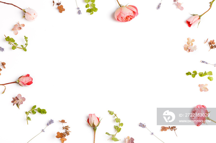 Festive flower composition on the white wooden background. Overhead view