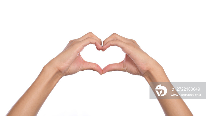 Woman hands making a heart shape on a white isolated background