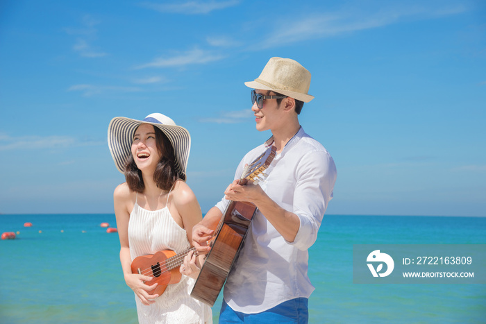 couple lover enjoy song and singing together on the sea beach at honeymoon and valentine occasion