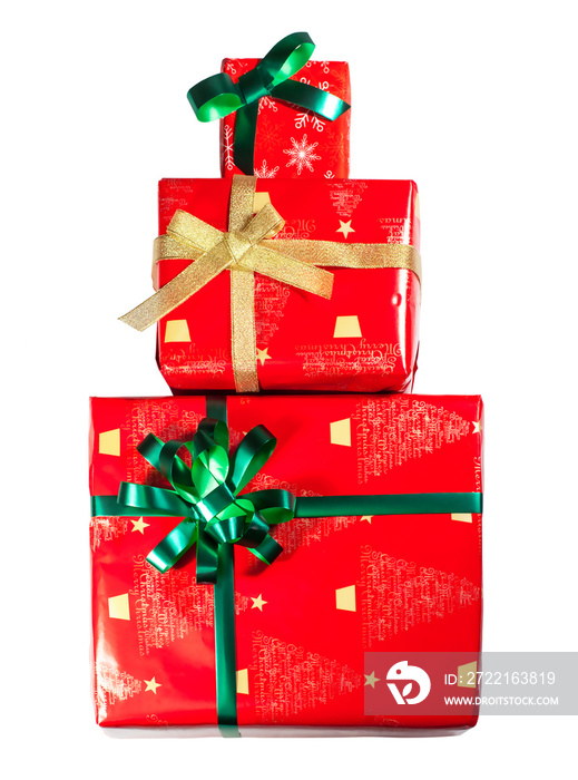 a set of gifts of red color with green and gold bows stacked, isolate. High quality photo