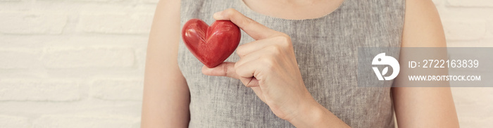 woman holding red heart, health insurance, donation charity concept, world health day, world mental 