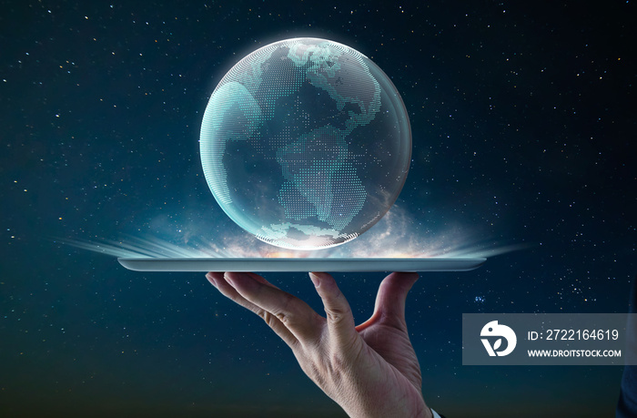 Waiter hand using digital pad holding digital glass planet earth with hologram design . Global busin