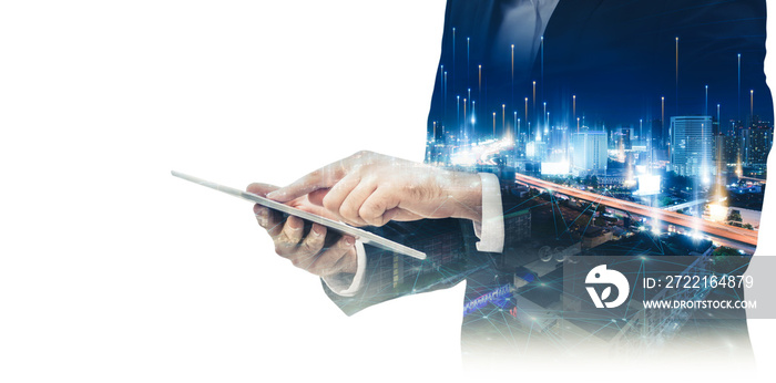 Double Exposure of Businessman Using Tablet With Graphic Media Screen and Cityscape Skyscrapers