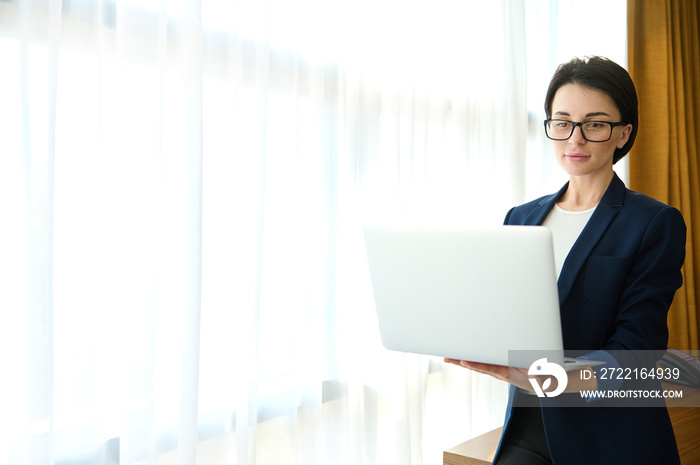 Prosperous concentrated woman, entrepreneur, journalist, sales manager in business casual suit worki