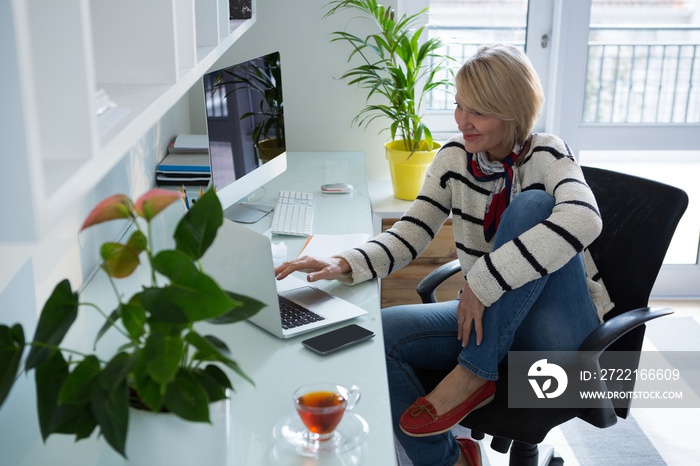 Beautiful woman using laptop