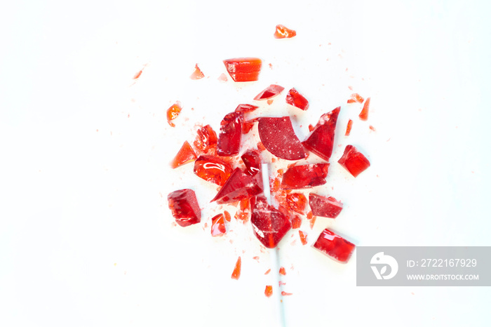 broken heart red lollipop sweet isolated on white background