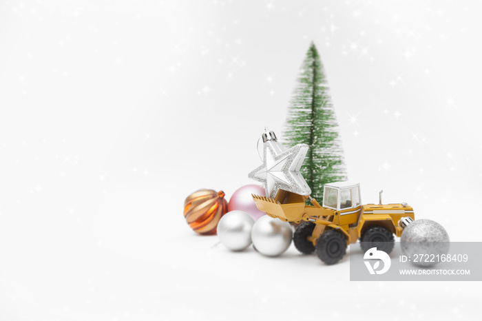 Christmas decoration on white with excavator toy