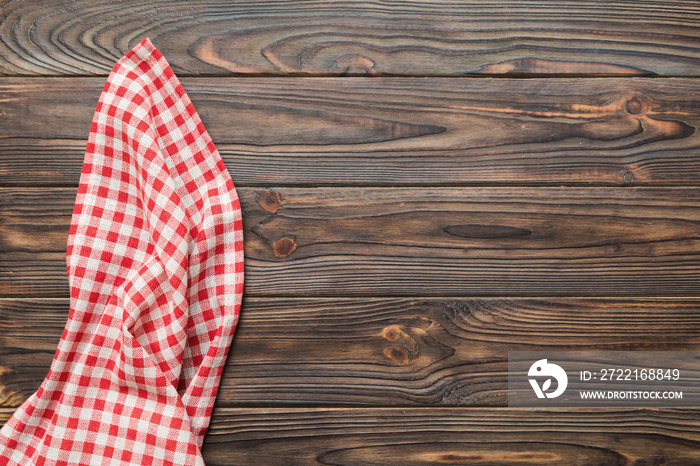 top view with red empty kitchen napkin isolated on table background. Folded cloth for mockup with co