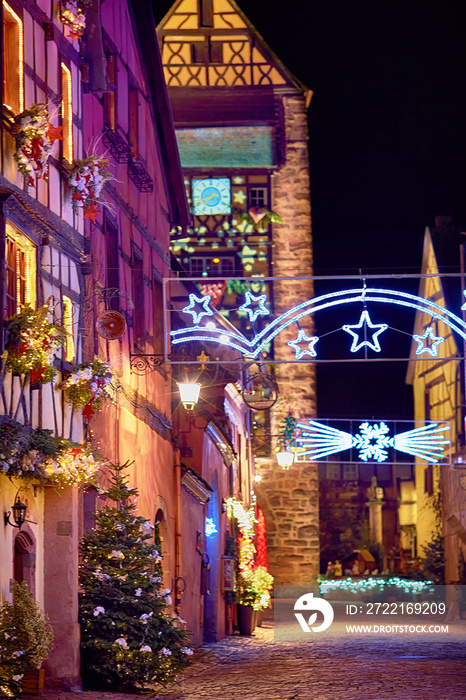 fairytale christmas street Rue du General de Gaulle of beautiful medival village Riquewihr, Alsace, 